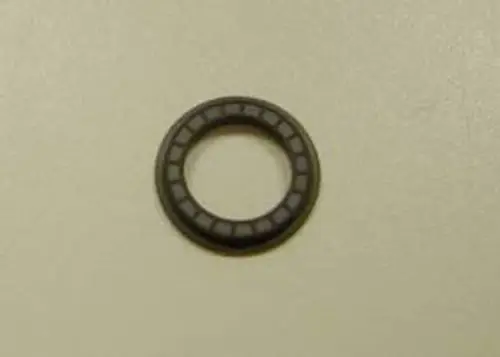 Dichtung in runder Form, möglicherweise für ein Gaskombiventil, auf einer neutralen Oberfläche. Produkt möglicherweise von Remeha.